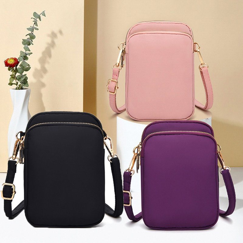 ミニマリストデザインの縦型クロスボディフォンバッグ、男女兼用 - Accordion Wallet Zip のレビューと価格